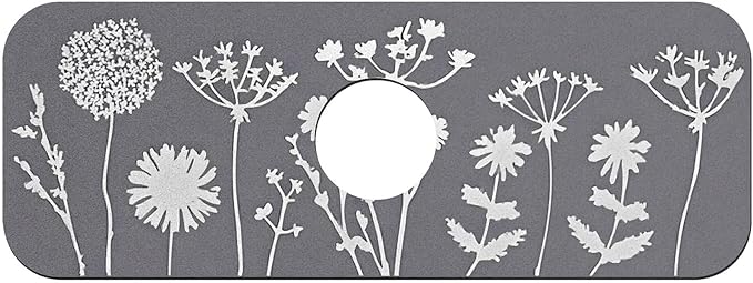 White flowers and grass silhouettes