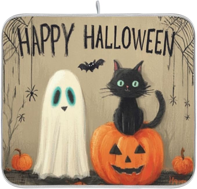 cute black cat an orange pumpkin