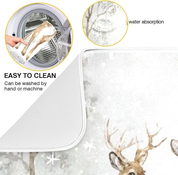 three deer in the snow