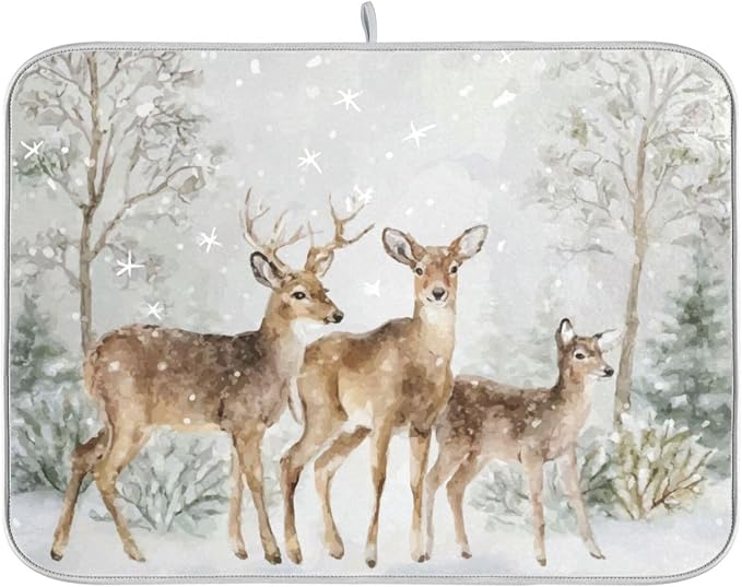 three deer in the snow