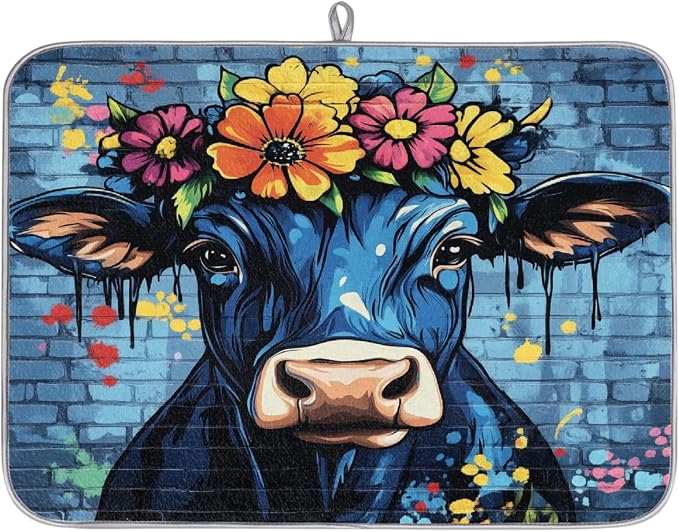 A Blue And Black Cow With Colorful Flowers