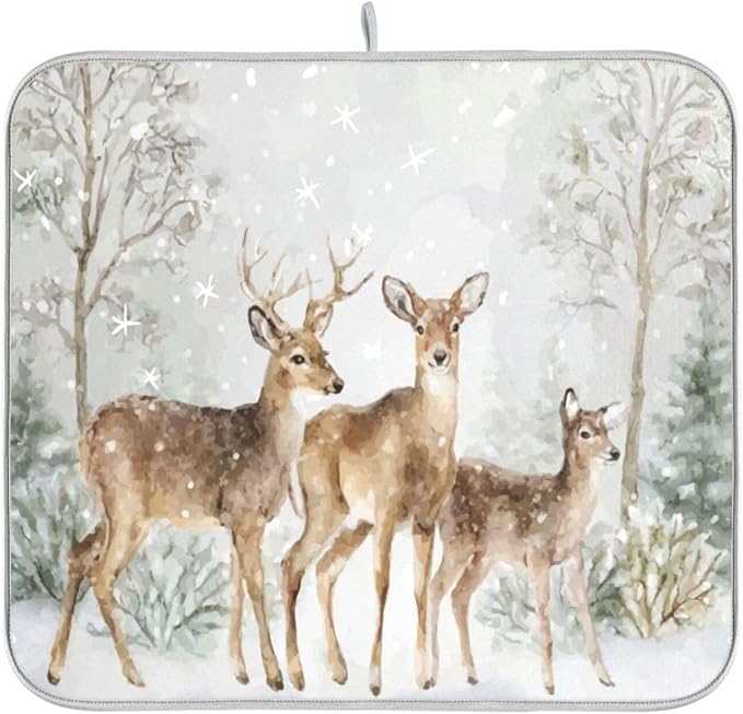three deer in the snow