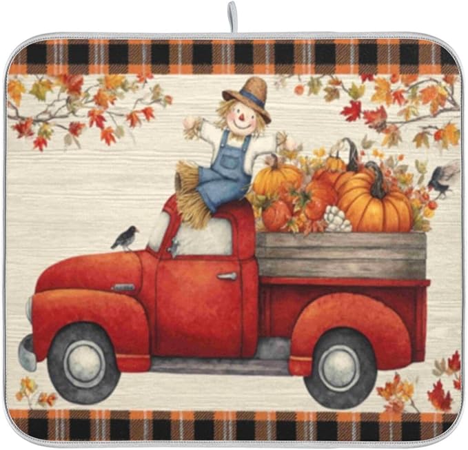 old red truck with autumn leaves