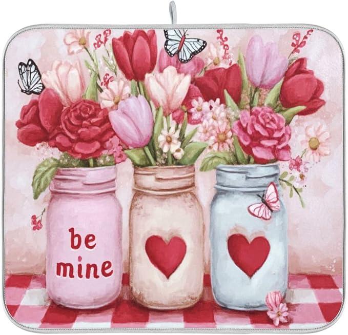 three mason jars red and pink roses