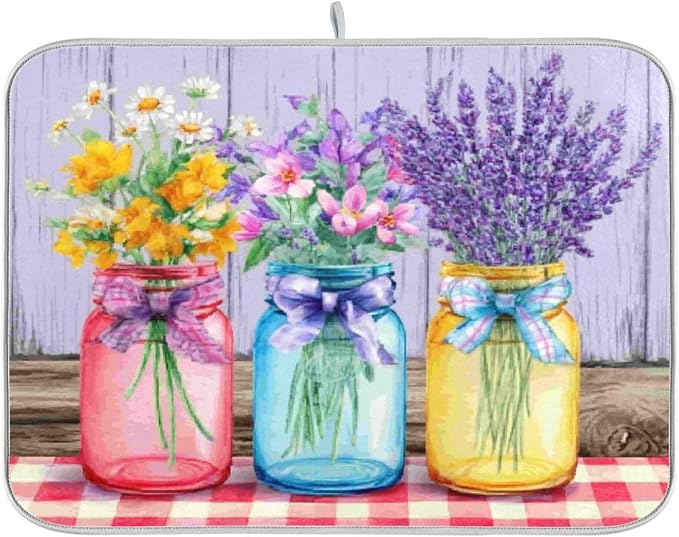 three colorful mason jars