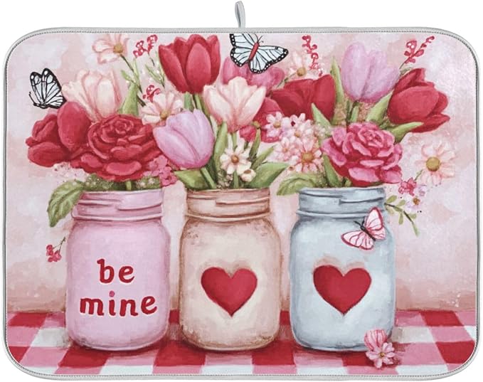 three mason jars red and pink roses